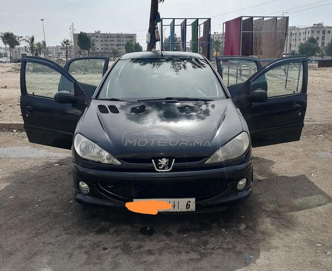 206 essence 2003 6ch dariba 350 dh