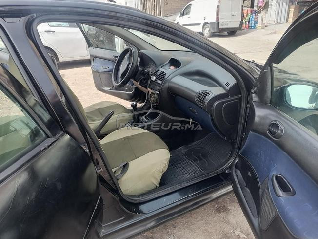 206 essence 2003 6ch dariba 350 dh