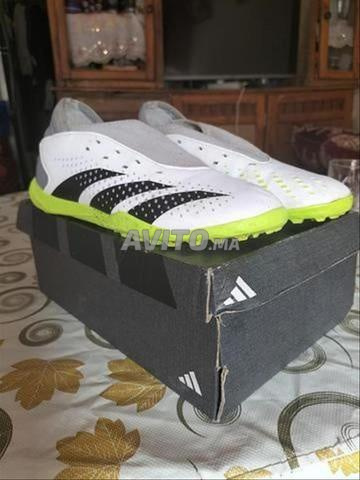 Chaussures de sport pour le football