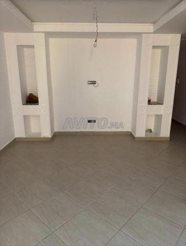 Maison R2 avec 3 appartements et garage
