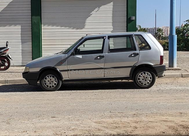 fiat UNO gris chrome