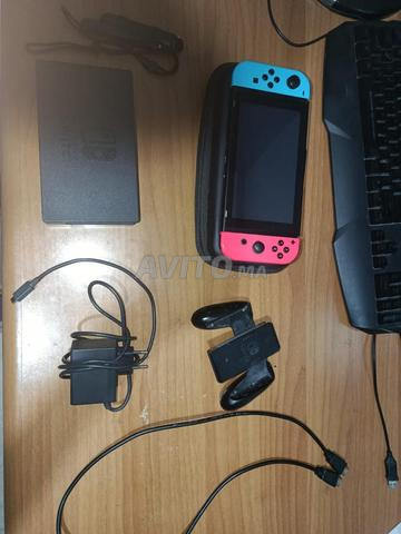 Nintendo Switch modèle 2021 plus 4 jeux - 2