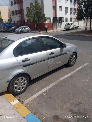 Hyundai Accent essence 2010 8 chevaux