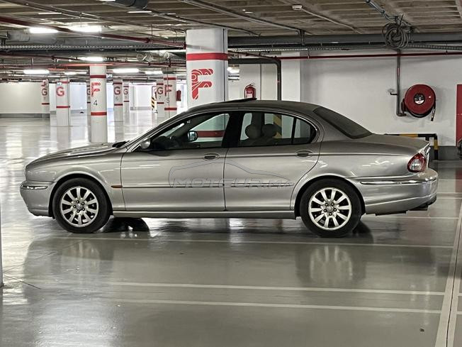 Jaguar X type vente cause départ étranger 