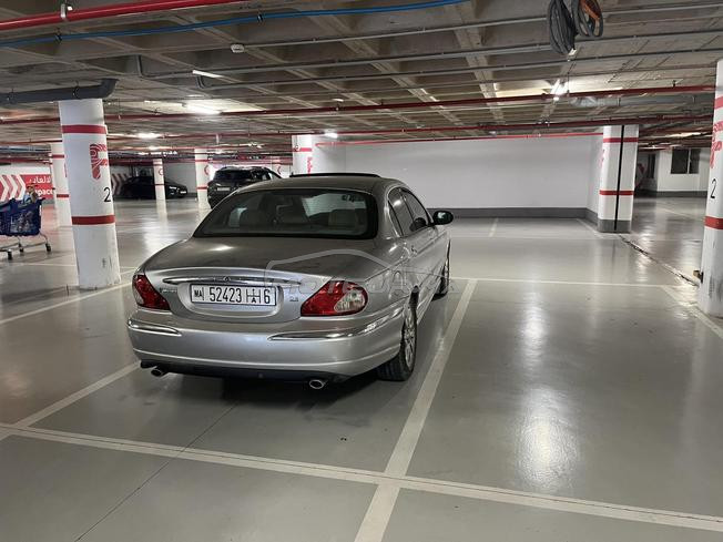 Jaguar X type vente cause départ étranger 