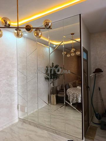Habillage mural miroitant sur mesure - 2