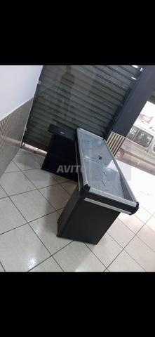 SORTIE DE CAISSE - 2