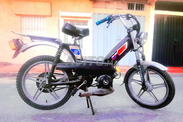 بيجو 103 SP