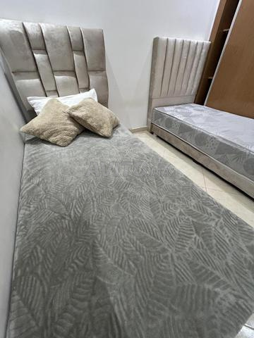 Lot de 2 lits individuels avec matelas