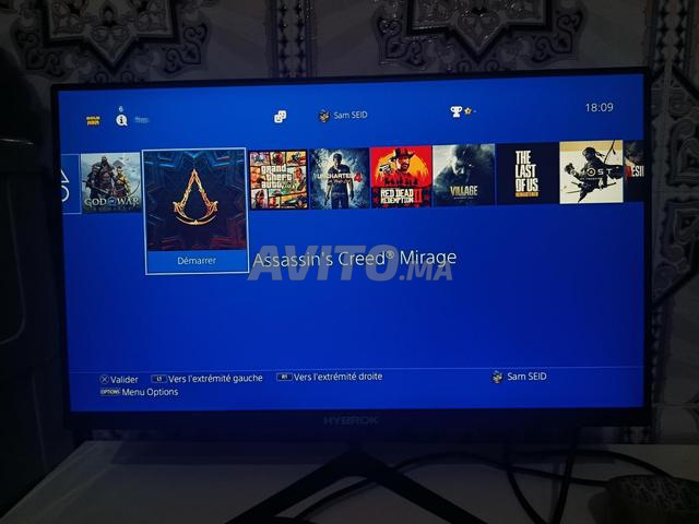 PS4 Slim 1 Tera avec 2 manettes et jeux - 2