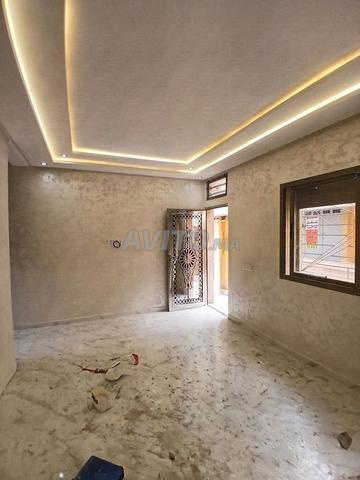 Appartement en rez-de-chaussée 3 chambres 94 m² - 2