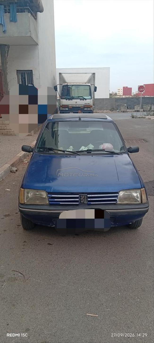 سيارة بيجو 205