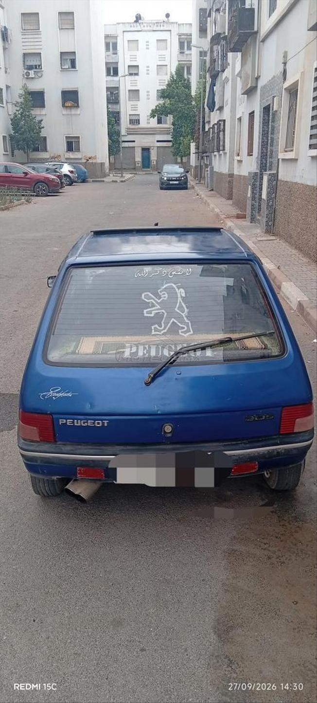 سيارة بيجو 205