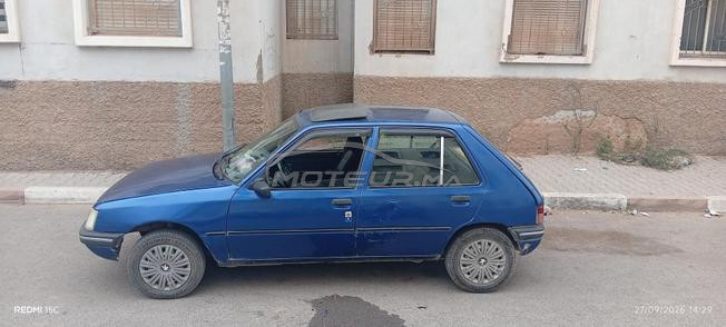 سيارة بيجو 205