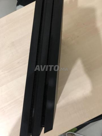 PS4 pro en ligne 1TB avec 1 manette avec 5 jeux CD - 2