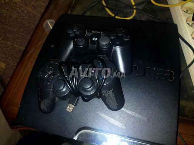 PS3 Slim avec 2 manettes - 2