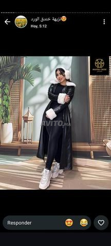 Manteau en cuir pour femme doublé de fourrure. Modèle - 2