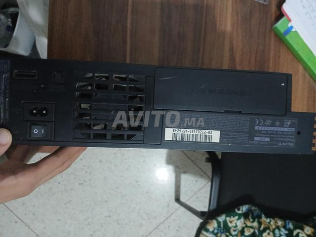 PS2 bon état et 2 jeux - 2