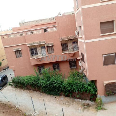 Appartement à louer avec ascenseur et cave voiture quartier Hay El Amal 90 m