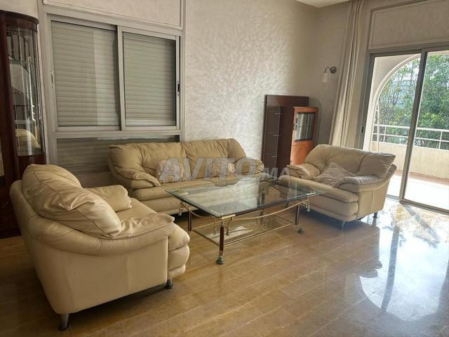 Salon en cuir et table en verre - 2