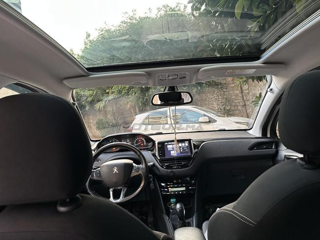 Peugeot 208 blue white 
