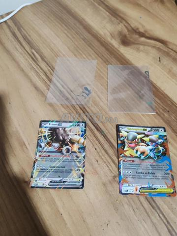 2 cartes pokémon à vendre avec les pochettes - 2