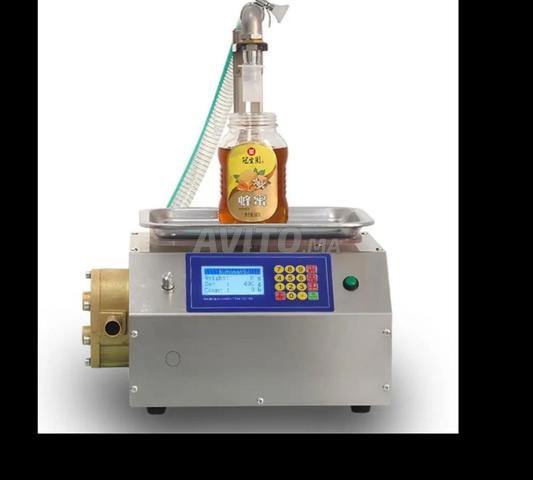 Bonjour, machine pour le remplissage de liquides