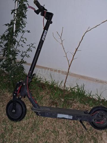 Trottinette Pro2 avec son chargeur