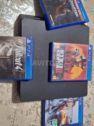 ps4 slim 1TB rdr2. fc26  plus 4 jeux - 2