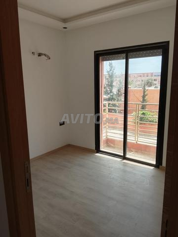 Appartement neuf 56m² parking titré moyen standing - 2