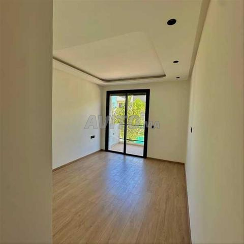 215879-Appt à louer à 14000DH à Ain Diab Extension - 2