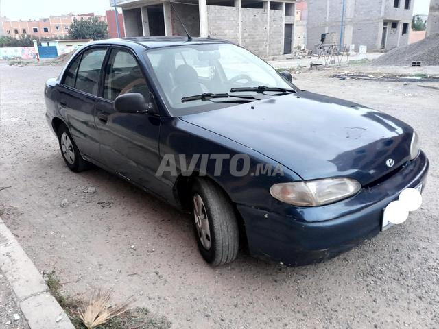 Hyundai Accent Essence 97 - 2