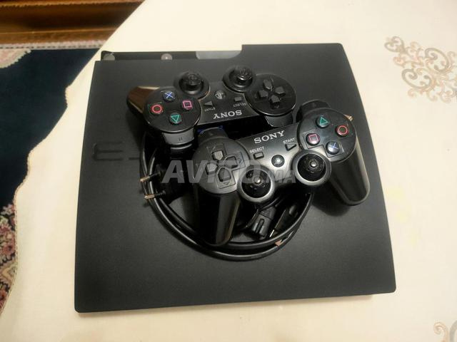PS3 Slim, 2 manettes, 15 jeux - 2