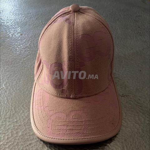Casquette Gucci rose/marron, 50dh /1 - 2