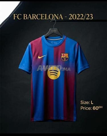 قميص برشلونة مقاس L