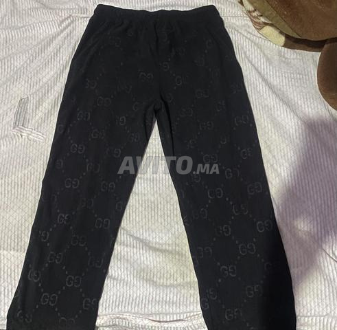 Pantalon noir Gucci. - 2