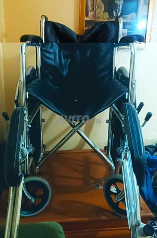 fauteuil roulant pliant repose jambes كرسي متحرك  - 2