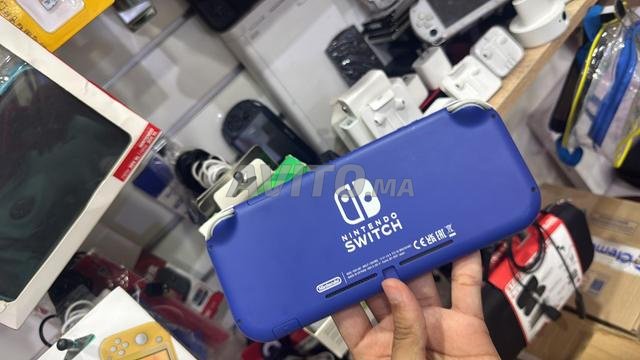 Nintendo Switch Lite Comme Neuf - 2