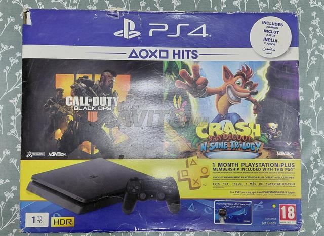 PS4 Slim 1 To - 2 jeux - manette originale - 2