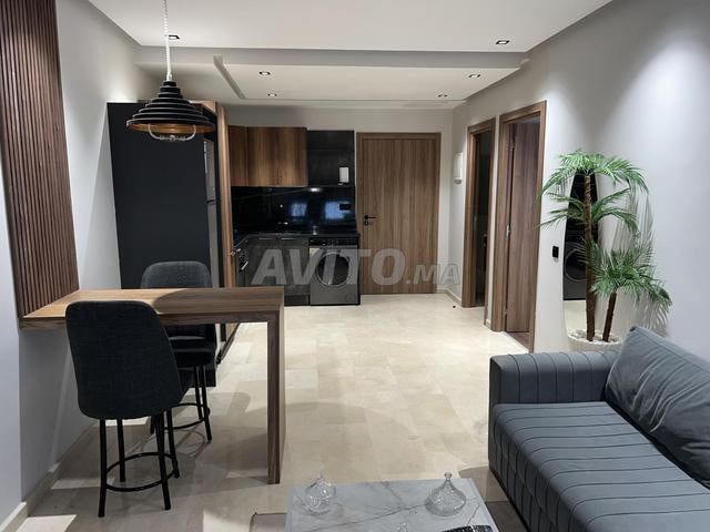 Studio meublé 50m² avec balcon, garage et ascenseur