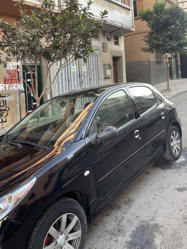 Peugeot 206plus 2011essence 6ch ba9a n9iya