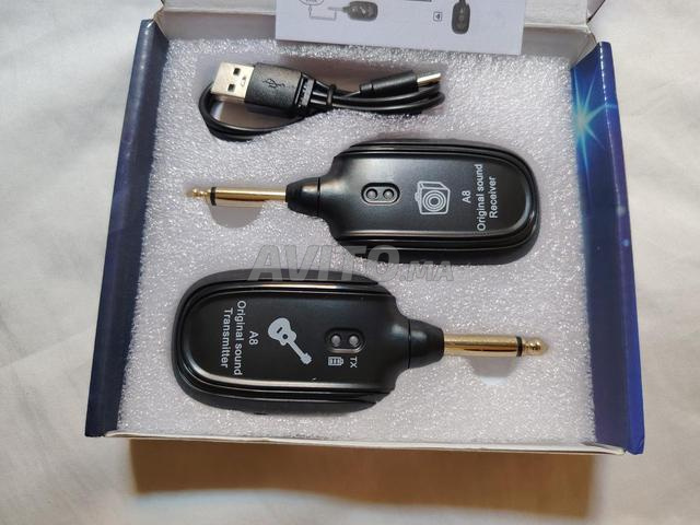 Système audio sans fil rechargeable pour guitare 2.4GHz - 2
