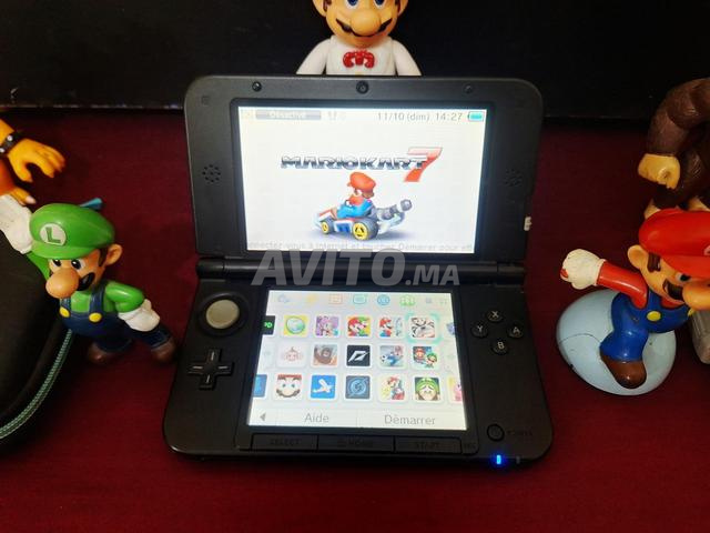 3DS XL excellent état Flashée plein de jeux - 2