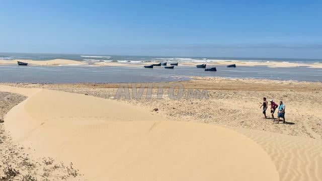 Terrain titré pied dans l’eau