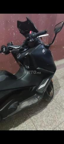Tmax 560 تيك مع عادم أكربوفيتش - 2