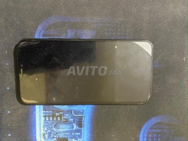 iPhone X 64 Go batterie changée état 100% - 2