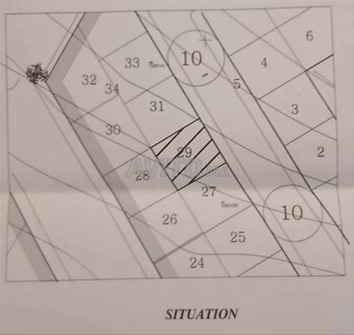 Terrain à vendre titré
Superficie 90 m²
Plan prêt - 2