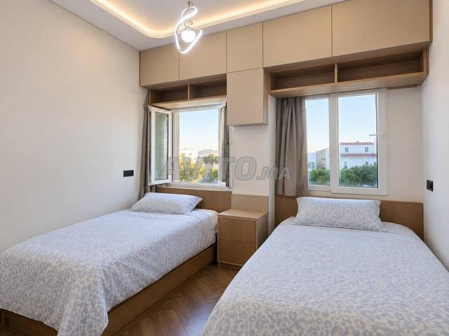 Appartement à louer 64 m² à Tanger - 2