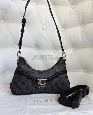 حقيبة كلاتش Guess بحزام كتف GS6328 - 2