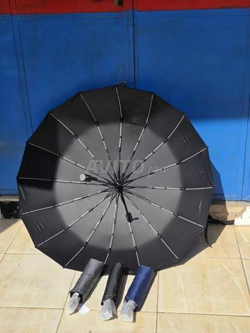 Parapluie noir pratique et neuf. - 2